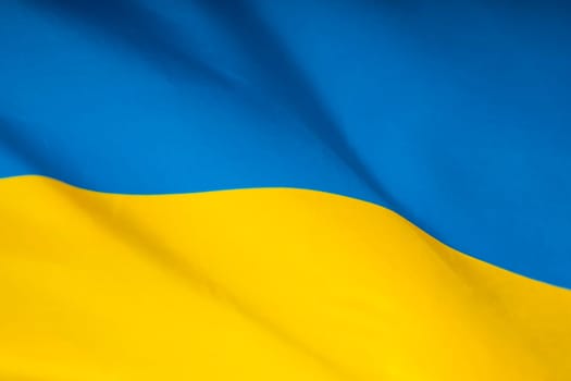 Flag of Ukraine. Blue and yellow colors. Close up shot, background