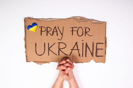 Pray for Ukraine concept background. Concept symbol of help support and no war in the country of Ukraine.