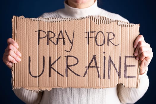 Pray for Ukraine concept background. Concept symbol of help support and no war in the country of Ukraine.