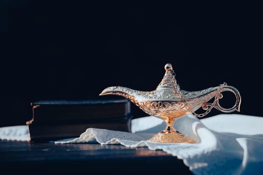 Ramadan Kareem festive greeting card for Muslim holy month with Aladdin lamp of wishes and Quran