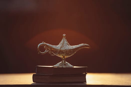 Ramadan Kareem festive greeting card for Muslim holy month with Aladdin lamp of wishes and Quran