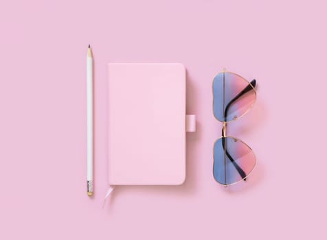 Hardcover textbook, heart sunglases and pensil on pink. Hardcover notebook mockup flat lay. Femminine girly and Travel concept