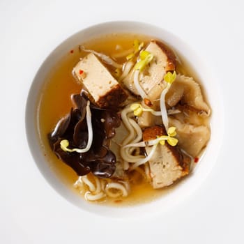 Ramen soup with tofu sprouts and mushrooms from above