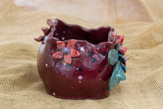 clay pot with flower decoration - handmade pottery