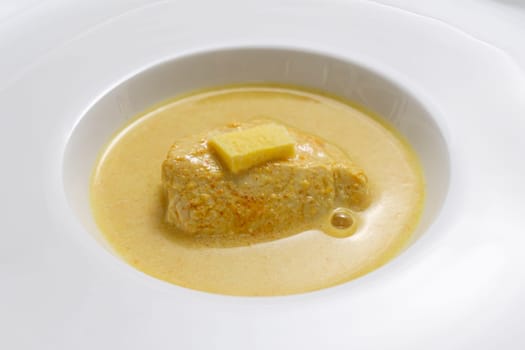 Chicken curry with ginger and coconut mild in a bowl