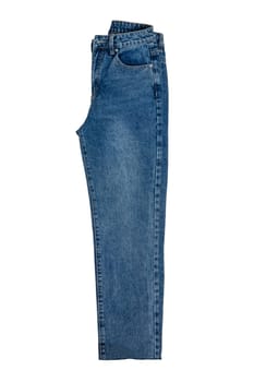 Woman jeans isolated. Folded trendy stylish female blue jeans trousers isolated on a white background. Clipping path. Fashionable denim pants for women.