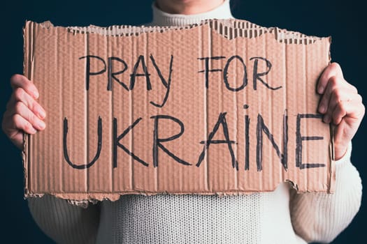 Pray for Ukraine concept background. Concept symbol of help support and no war in the country of Ukraine.
