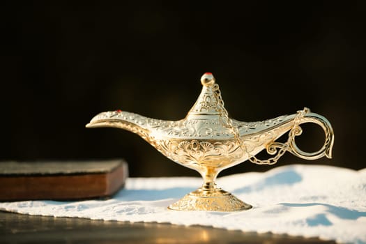 Ramadan Kareem festive greeting card for Muslim holy month with Aladdin lamp of wishes and Quran