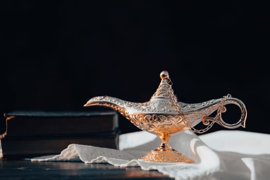 Ramadan Kareem festive greeting card for Muslim holy month with Aladdin lamp of wishes and Quran