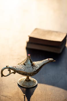 Ramadan Kareem festive greeting card for Muslim holy month with Aladdin lamp of wishes and Quran