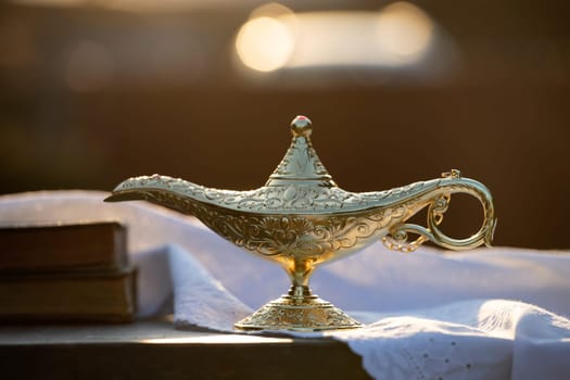 Ramadan Kareem festive greeting card for Muslim holy month with Aladdin lamp of wishes and Quran