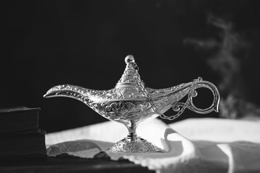 Ramadan Kareem festive greeting card for Muslim holy month with Aladdin lamp of wishes and Quran