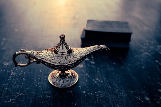 Ramadan Kareem festive greeting card for Muslim holy month with Aladdin lamp of wishes and Quran