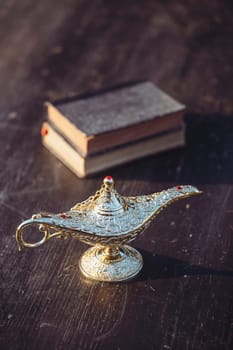 Ramadan Kareem festive greeting card for Muslim holy month with Aladdin lamp of wishes and Quran