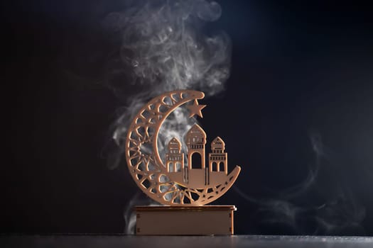 Ramadan Kareem background. Ornamental Arabic lantern glowing at night