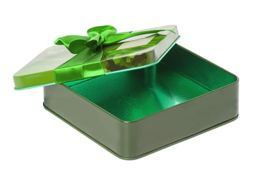 Closeup of a decorative opened green present or gift box with ribbon bow isolated on a white background. Birthday, Christmas, Valentine's Day. Macro.