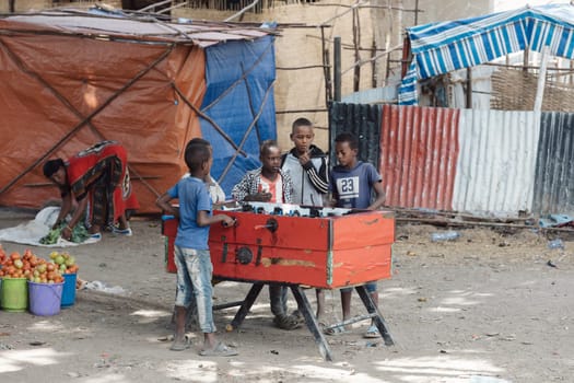 Lake Koka, Oromia Region, Ethiopia - May 16, 2019: Ethiopian boys play table football in Meto Aleka. Meto Aleka, Oromia Region, Ethiopia, Africa