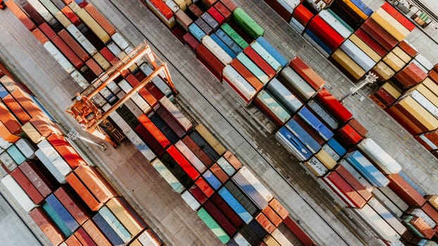 Aerial view of shipping container port terminal. Colourful pattern of containers in harbor. Maritime logistics global inport export trade transportation