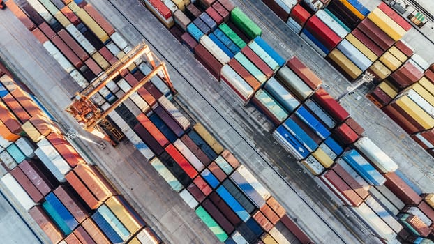 Aerial view of shipping container port terminal. Colourful pattern of containers in harbor. Maritime logistics global inport export trade transportation