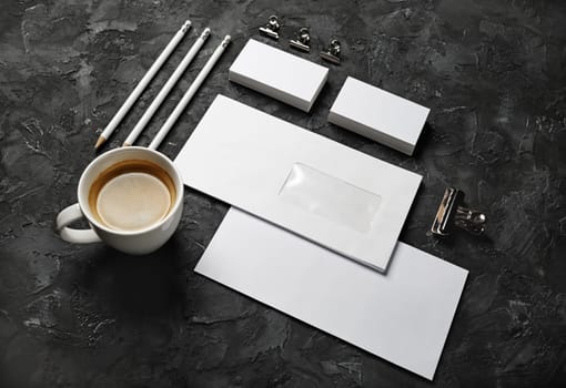 Blank stationery set on black plaster background. ID template. Mockup for branding identity for designers.