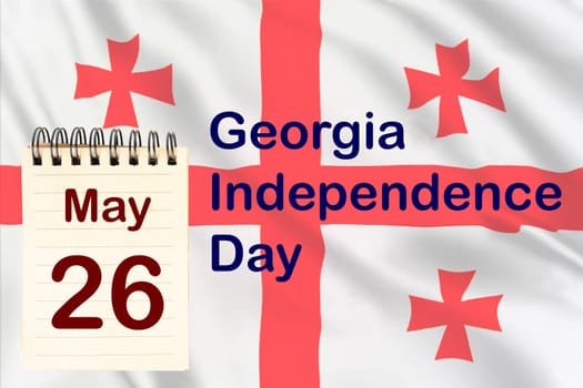 The celebration of the Georgia Independence with the flag and the calendar indicating the May 26