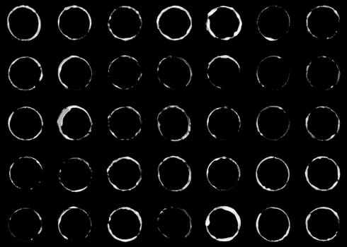 Collection of 35 hand dawn circle made with brush - white on black