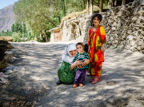 August 26, 2016, Margib village, Tajikistan: Local children with their grandmother in a small village in Yaghnob region of Tajikistan