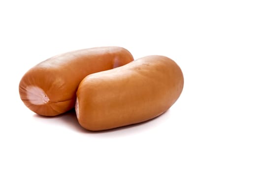 Juicy sausages on a white isolated background. High quality photo