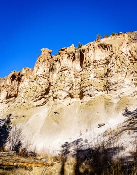 A view of the main cliff of Bandelier National Monument showing cave dwellings