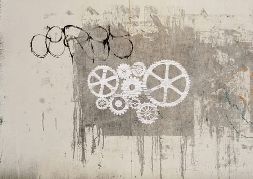 White gears drawed on gray wall
