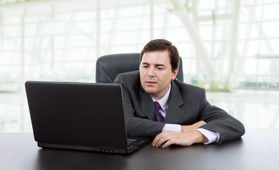young business man working with is laptop