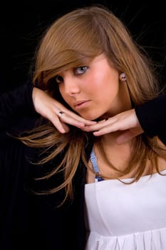 young beautiful girl portrait against black background