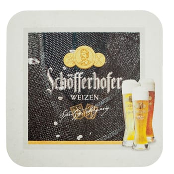 BERLIN, GERMANY - MARCH 15, 2015: Beermat of German beer Schoefferhofer isolated over white background