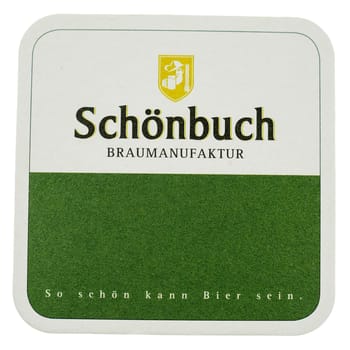 BERLIN, GERMANY - MARCH 15, 2015: Beermat of German beer Schoenbuch isolated over white background