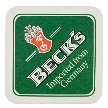 BERLIN, GERMANY - MARCH 15, 2015: Beermat of German beer Becks isolated over white background