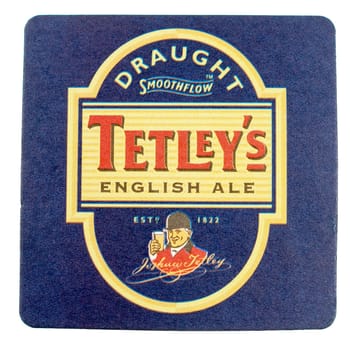 LONDON, UK - MARCH 15, 2015: Beermat of British beer Tetley isolated over white background