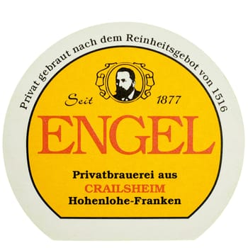 BERLIN, GERMANY - MARCH 15, 2015: Beermat of German beer Engel isolated over white background