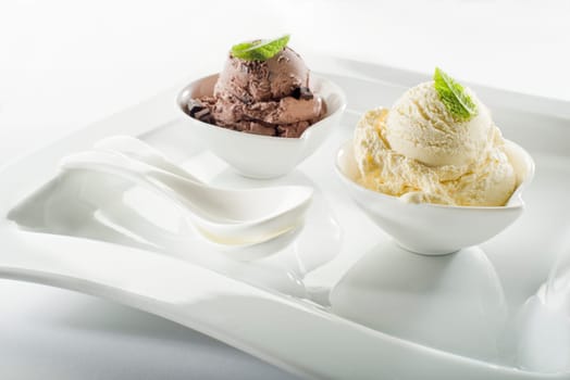 Ice cream in bowl on white background