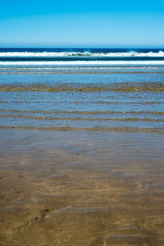 calm soft waves lashing onto ballybunion beach in county kerry ireland