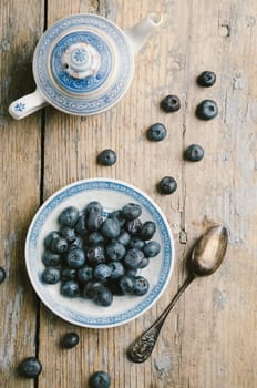 Blueberries on rustic wooden table