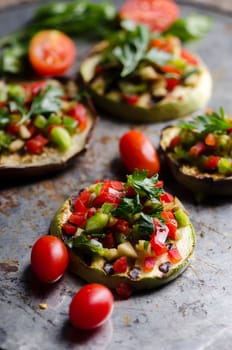 Mediterranean cuisine with eggplant, squash, parsley and cherry