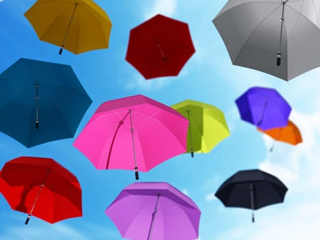 Flying umbrellas at the blue sky