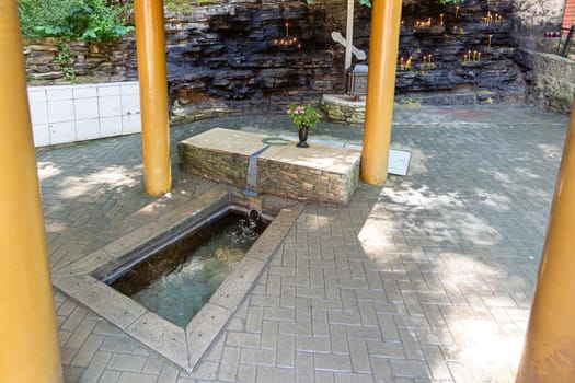 Neberdzhaevskaya, Russia - July 24, 2021: One of the sources of the complex of springs "Holy handle"" in the Krymsky district of the Krasnodar Territory, not far from the village of Neberdzhaevskaya"