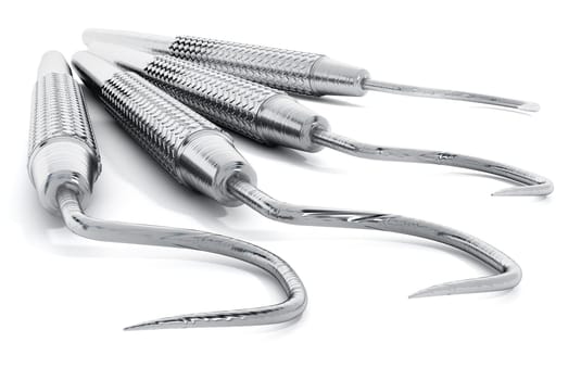 Dentist tools isolated on white background.