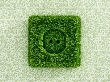 Power outlet covered with green grass