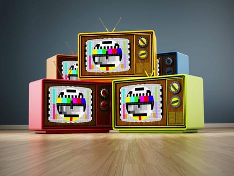 Vintage televisions with test screens standing on wood