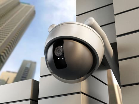 Dome camera hanging on the wall of office building.