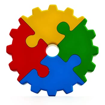 Multi colored gear consisting of puzzle parts isolated on white background