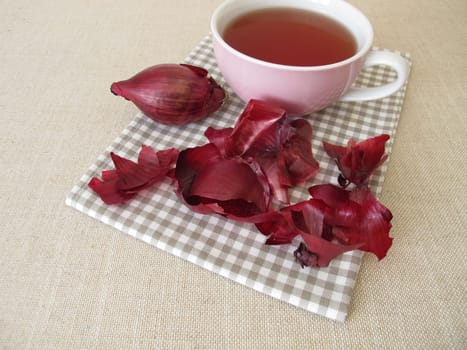 A cup of red onion peel tea