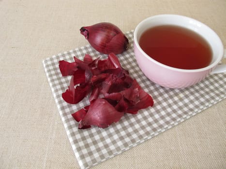 A cup of red onion peel tea